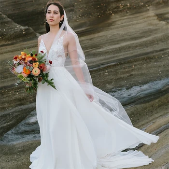 15407# Elegantiški spagečių dirželiai Šifonas A linijos vestuvinė suknelė Iliuzija Gėlių aplikacija Žemas kaušelis Atgal Nuotakos suknelė Pagaminta pagal užsakymą