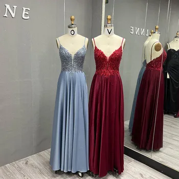 2023 Vyno raudonos ilgos prom suknelės Dirželiai Karoliukai siuvinėtas šilkas Satin Oficiali moterų vakarėlio suknelė su plyšiu