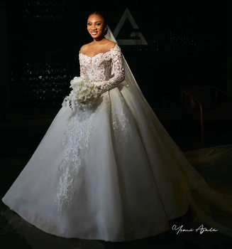 Ilgomis rankovėmis A-line African Wedding Dresses A-line Sheer Appliques Nėriniai Aso Ebi Moterys Vestuvinės suknelės juodaodėms merginoms