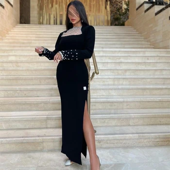 Santorinis juodas šoninis plyšys Undinėlė Prom suknelės Saudo Arabija Moterys dėvi karoliukais puoštus kristalus Vakarinė vakarėlio suknelė ilgomis rankovėmis Vestidos