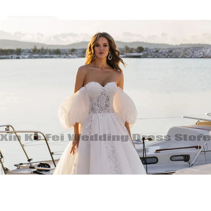 2023 Bohemiškos vestuvinės suknelės Moteriškos nėrinių aplikacijos Tiulis Be rankovių nuotakos chalatai Oficialus paplūdimio vakarėlio chalatas De Mariée Vestido Novia